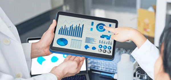 Medical researchers analyzing clinical data